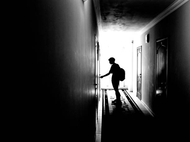 istock Woman opening the door 1154133225