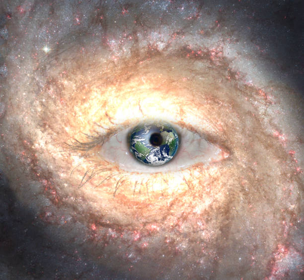 istock Eye in midst of Galaxy with Earth Reflection 1154139026