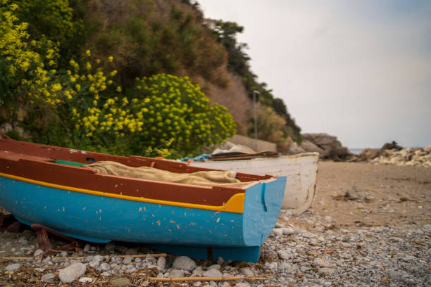 istock two abandoned boats on capri island 1154143664