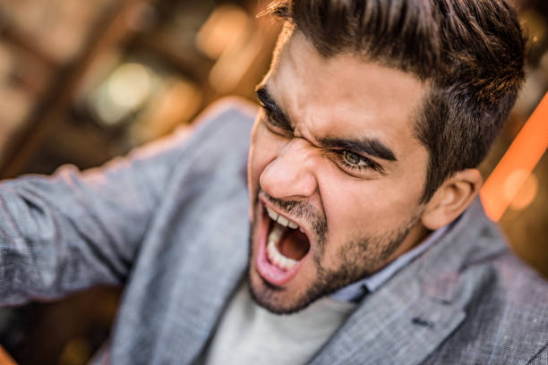 istock Angry young businessman shouting. 1154151248