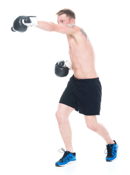 istock Shirtless handsome man boxing 1154158389