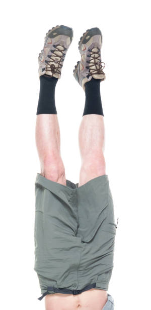 istock Friendly male hiker is doing a handstand 1154160875