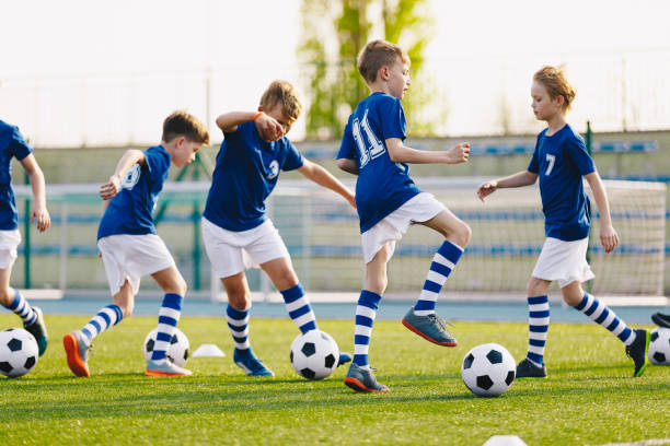 istock Soccer Training - Warm Up and Drills. Boys 1154162640