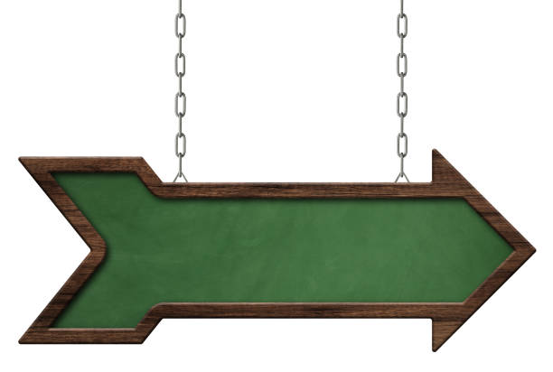 istock Green blackboard with dark frame and direction arrow shape hanging on chains 1154163356