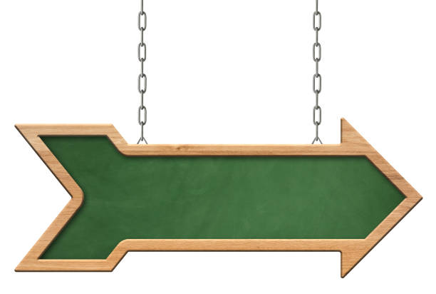 istock Green blackboard with bright frame and direction arrow shape hanging on chains 1154163418