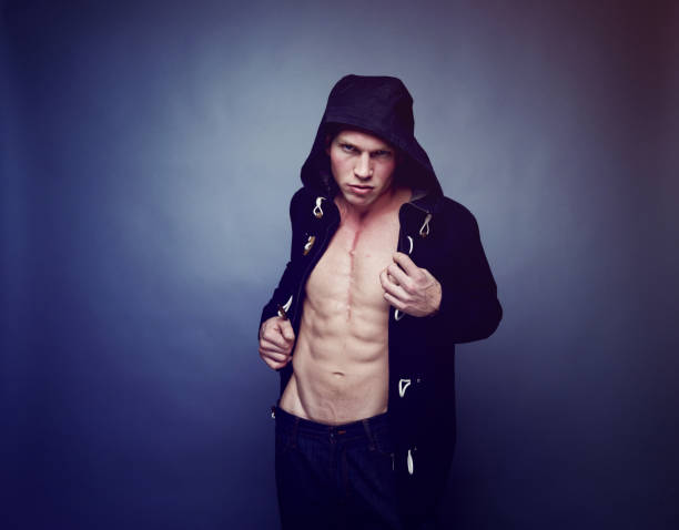 istock Sexy man wearing warm clothing 1154168954