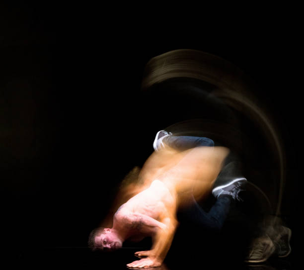 istock Shirtless man moving around with motion blur 1154171274