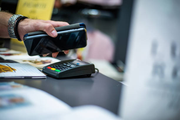 istock Wireless payment via smartphone 1154171942