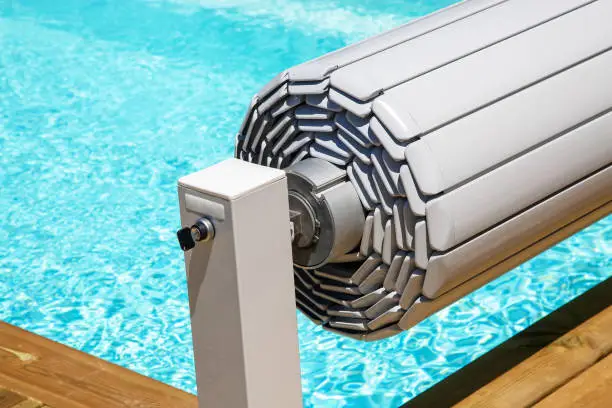 Photo of pool shutter to conserve heat and protect from accidental falls