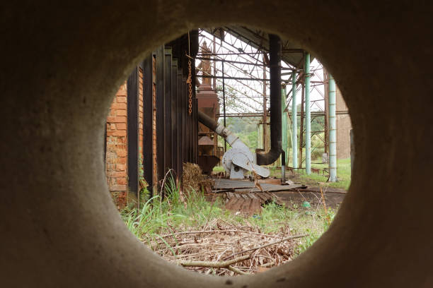 istock Blast Furnace Site Viewed Through a Concrete Pipe 1154182364