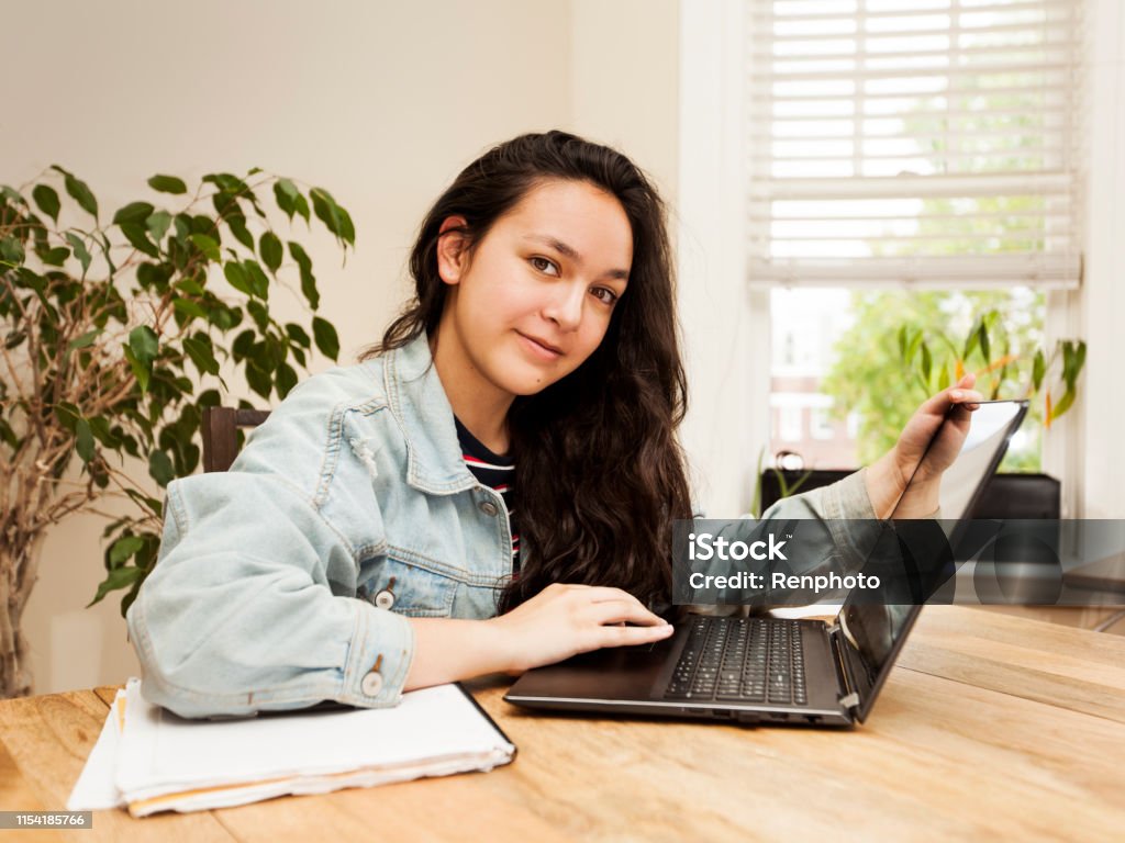 Teenager Doing Homework Teenager Stock Photo