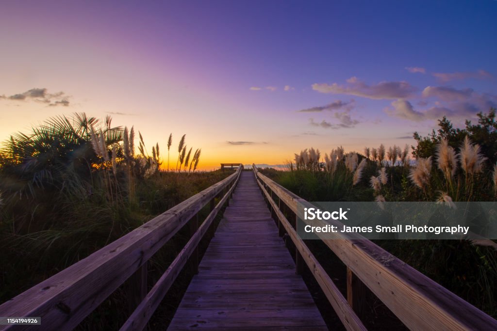 Boardwalk Sunrise Sunrise over the Isle of Palms South Carolina Stock Photo