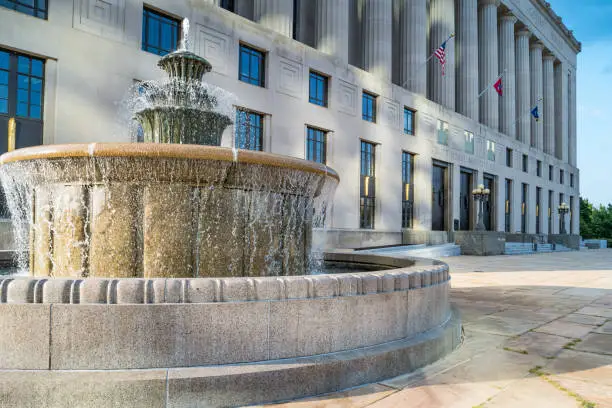 Stock photograph of a fountain in front of the City Hall in Nashville, Tennessee, USA on a sunny day.