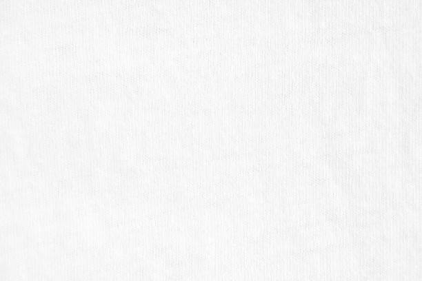 istock White blank crumpled cotton fabric texture background. 1154218003