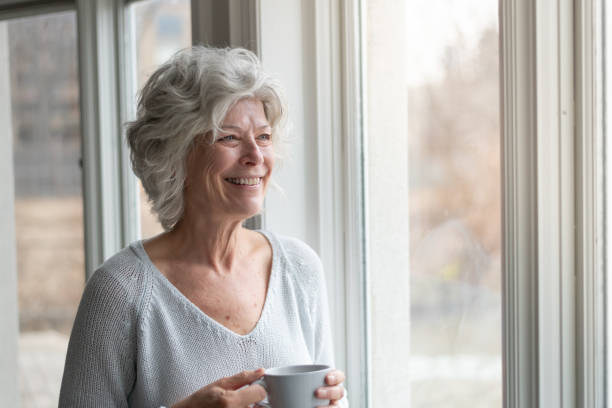 istock Happy senior woman 1154221316