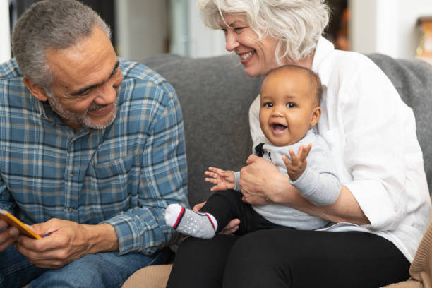 istock Mixed Ethnic Grandparents Spending Time With Their Granddaughter 1154221846