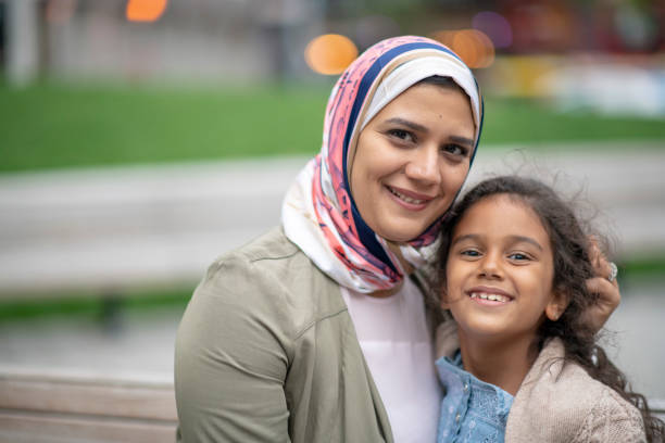 istock Mother and daughter hugs 1154229996