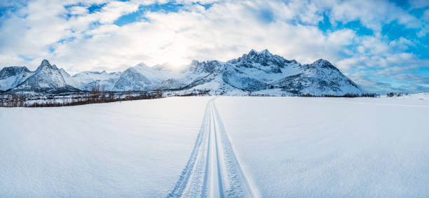 istock Winter sunset view on the road trip 1154254683