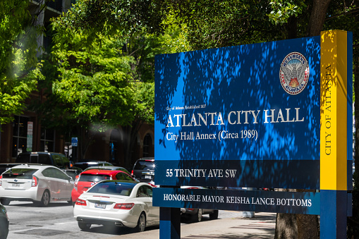 Atlanta, USA - April 20, 2018: City hall sign near state capitol building in Georgia on Trinity avenue