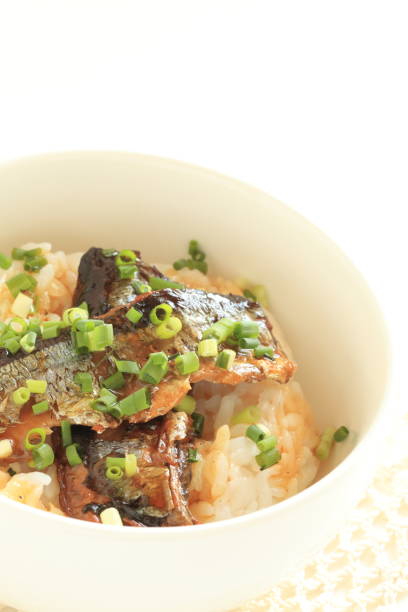 istock Canned food, simmered pacific saury on rice 1154263324