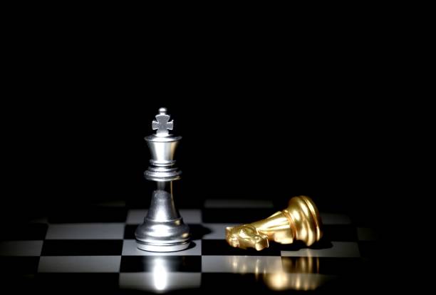 istock chess board game concept for competition and strategy 1154266089
