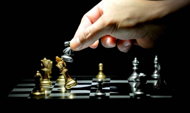 istock chess board game concept for competition and strategy 1154266158
