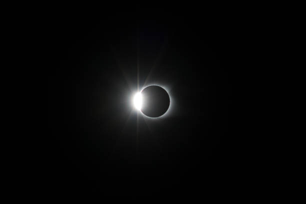 istock Total Solar Eclipse where the moon passes in front of the sun creating a diamond ring effect 1154269830