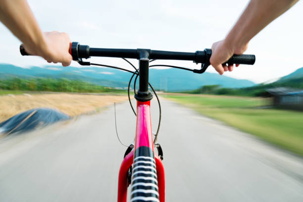 Bike riding on the move, view from riders perspective.