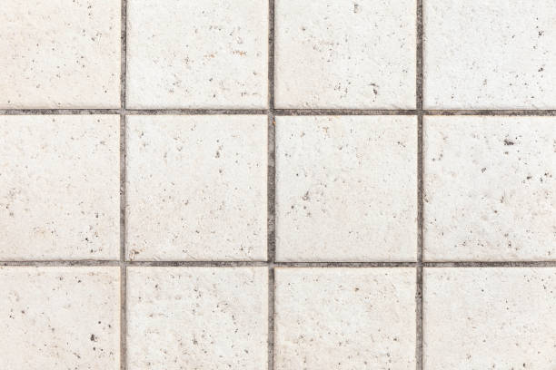 istock Abstract background of old cobblestone pavement close-up 1154289513