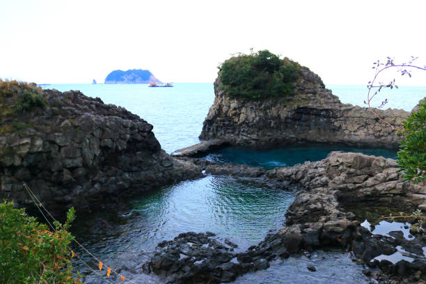 istock Faerie Bath, coast, cliff, lava, sea, 1154317538