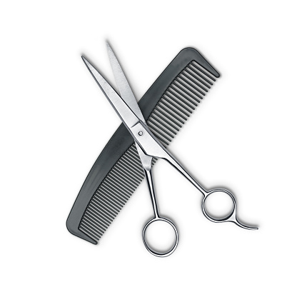 Hair cutting shears and comb isolated on white