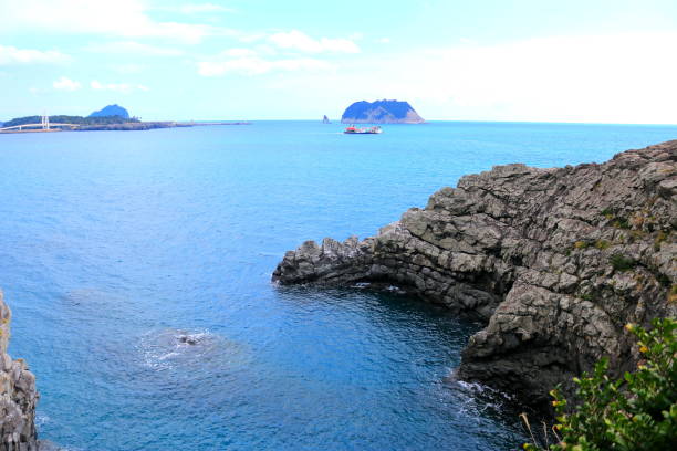 istock Faerie Bath, coast, cliff, lava, sea, 1154318170
