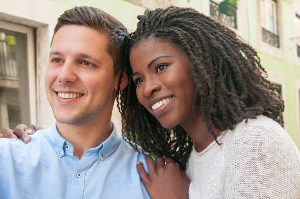 istock Positive young interracial lovers dreaming together 1154318625