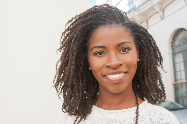 istock Happy beautiful black girl with dreads 1154318669