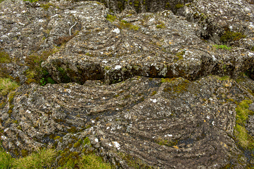 Small rift in lava dividing the American and Eurasian continental tectonic plates in Silfra, Iceland
