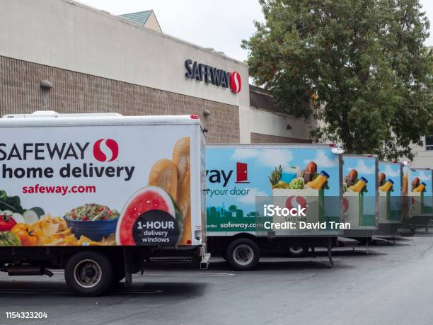 Fleet Of Safeway Home Grocery Delivery Trucks Outside Of Store Location Stock Photo - Download Image Now