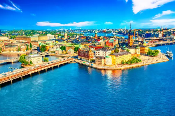 Photo of Beautiful aerial view of Stockholm Old town Gamla Stan from the City Hall Stadshuset. Beautiful summer sunny day in Stockholm, Sweden.