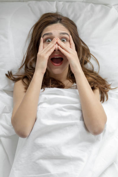 istock Woman in bed 1154327320