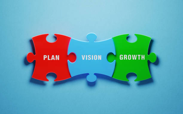 istock Vision Concept - Colorful Jigsaw Puzzle Pieces On Blue Background 1154327649