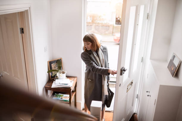 istock Arriving at home and checking mail. 1154328790