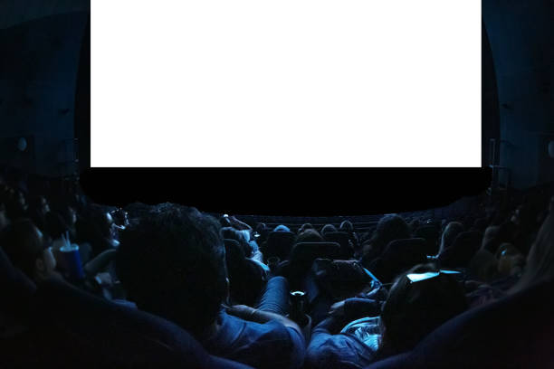 people in the cinema watching a movie. blank empty white screen. leisure entertainment concept. - full screen imagens e fotografias de stock