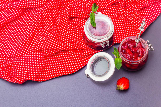Strawberry jam in a glass jar
