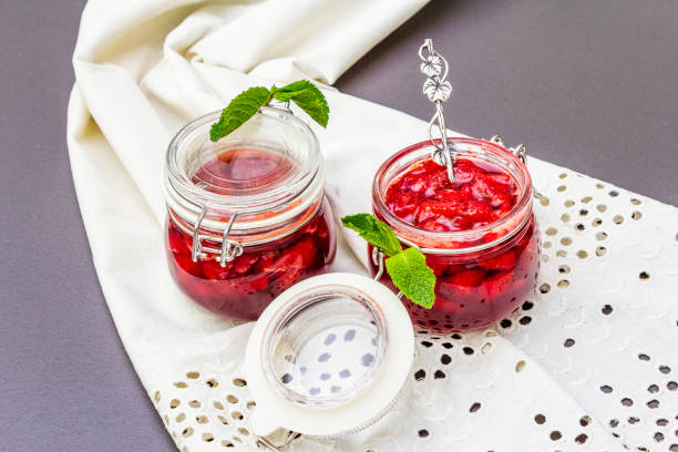 istock Strawberry jam in a glass jar 1154332461