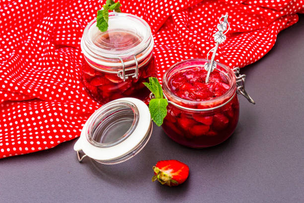 Strawberry jam in a glass jar