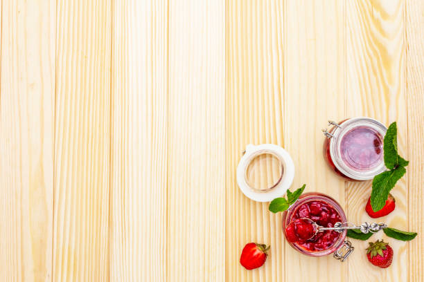 istock Strawberry jam in a glass jar 1154333549