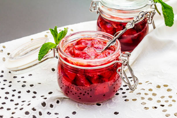 istock Strawberry jam in a glass jar 1154333656