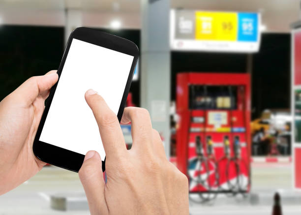 istock mobile phone in gas station 1154336469