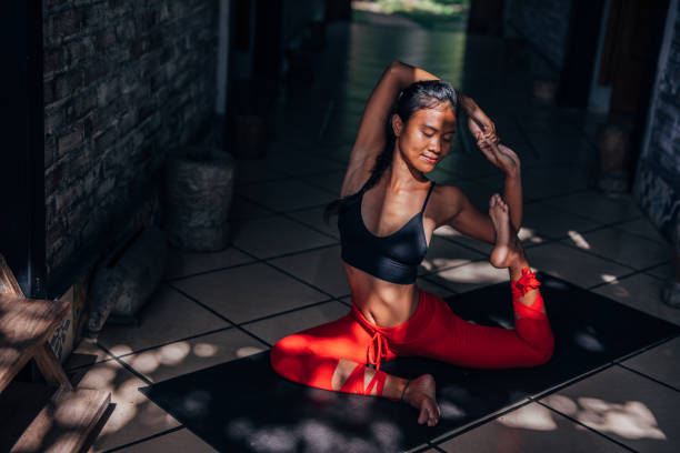 istock Young Beautiful Woman Doing Yoga 1154341557
