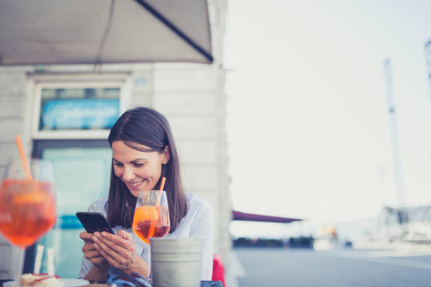 istock Young Italian women enjoying after work in bar 1154343232