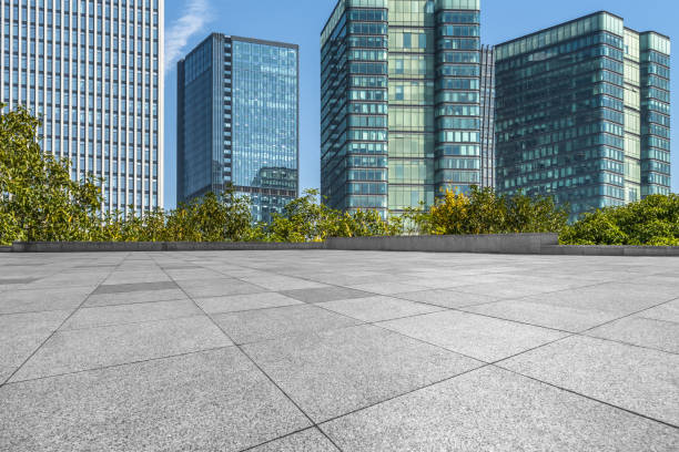 istock empty brick floor front of modern buildings 1154348439